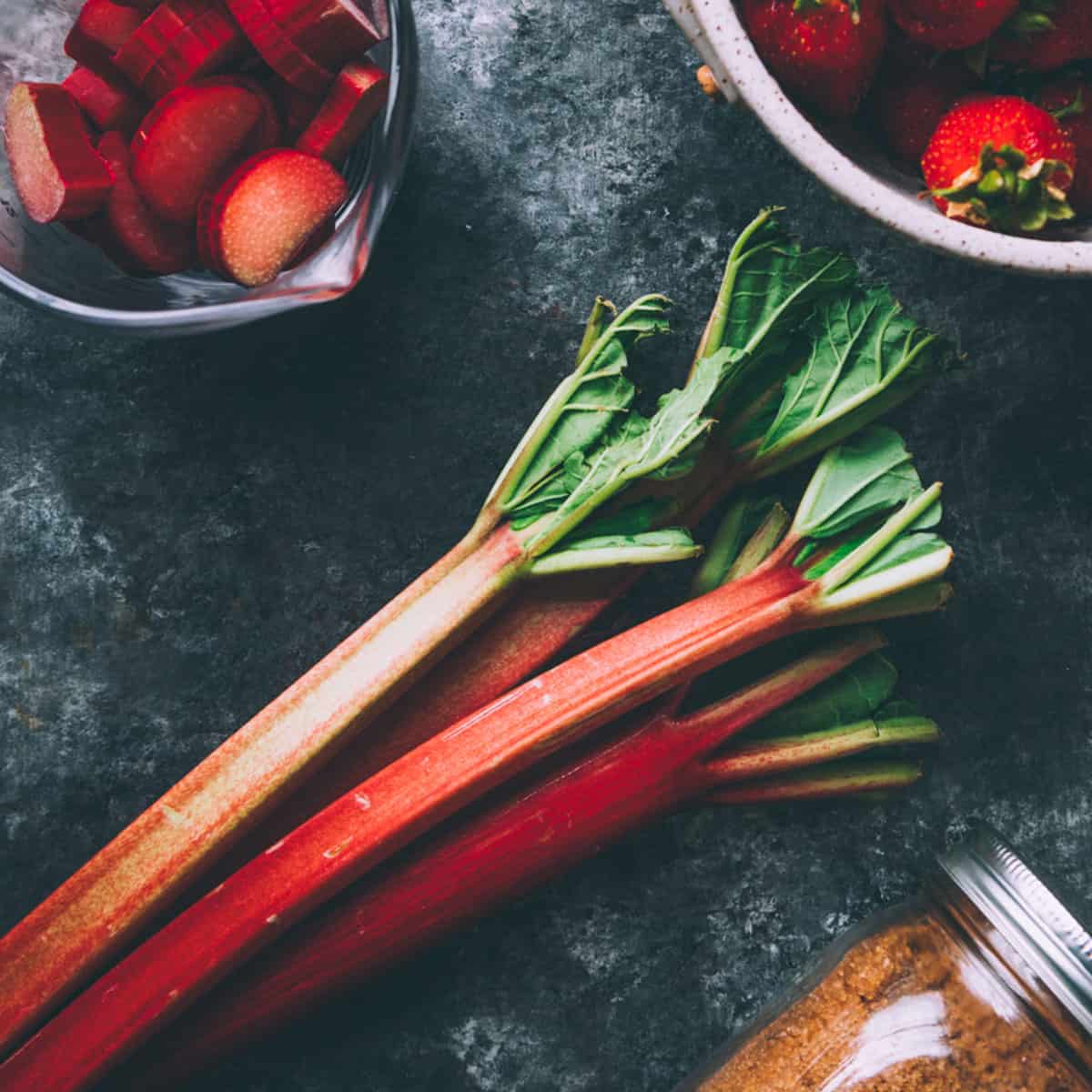 a table with fresh rhubarb stalks