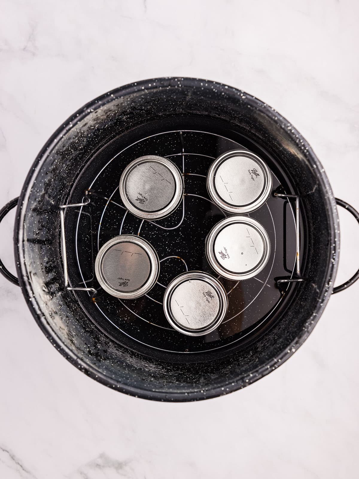 5 jars in a water bath canner, top view. 